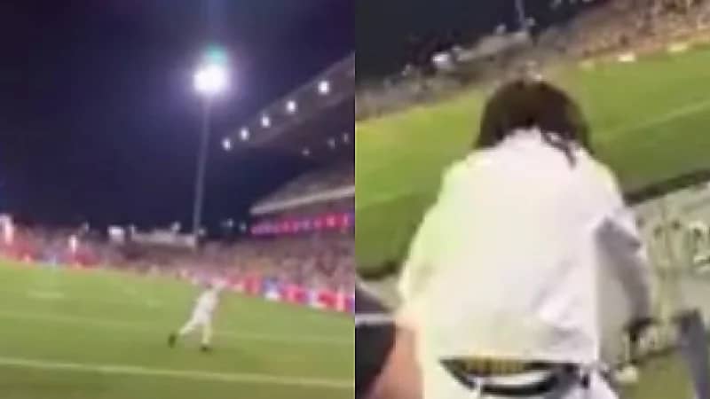 مشجع إنجليزي يفاجئ الجمهور وينزل أرض الملعب بعد فوز فريقه .. فيديو