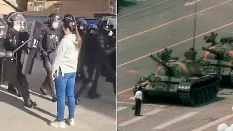 فتاة محتجة تتحدى شرطة مكافحة الشغب في الصين