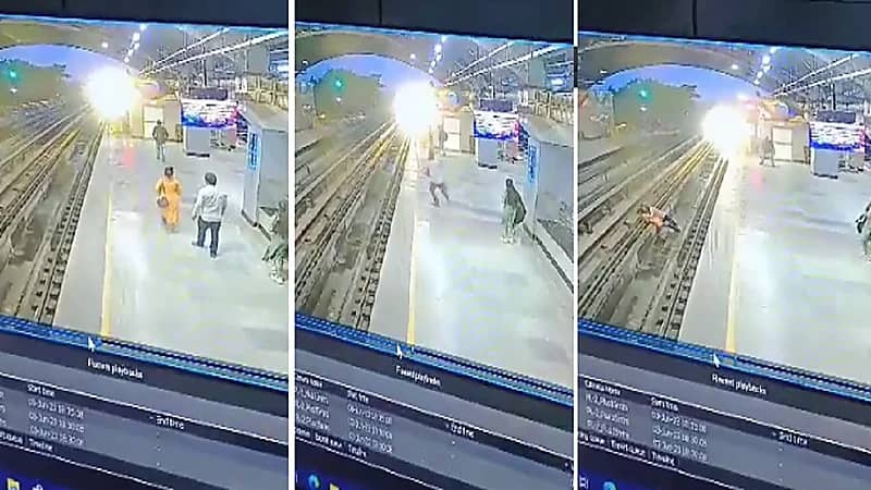 زوج يحمل زوجته ويقفز بها أمام  قطار للموت معا.. فيديو