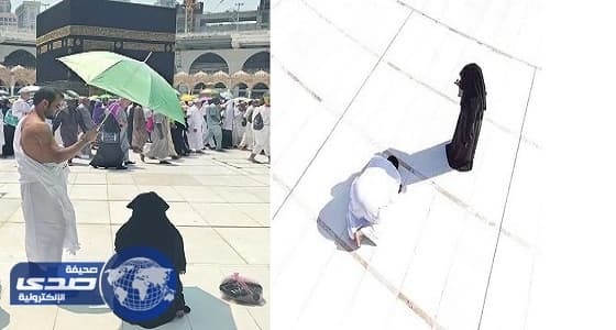 بعد " مظلة زوجها ".. صورة لحاج يحمي زوجته من الشمس تشعل " تويتر "