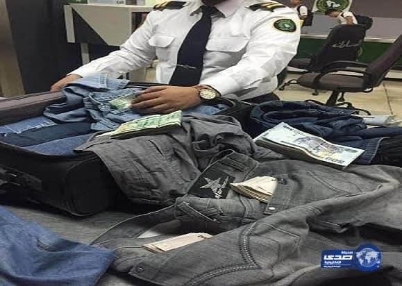 بالصور..  ضبط بنجلاديشي حاول تهريب 2.3 مليون ريال بـ"أبها"