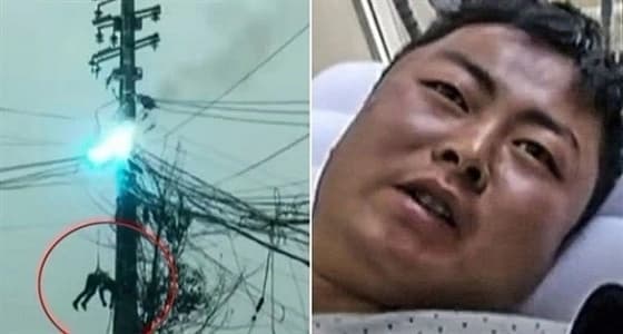 لحظات مرعبة لعامل صيني معلق في الهواء والنار حوله