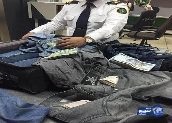 بالصور..  ضبط بنجلاديشي حاول تهريب 2.3 مليون ريال بـ"أبها"