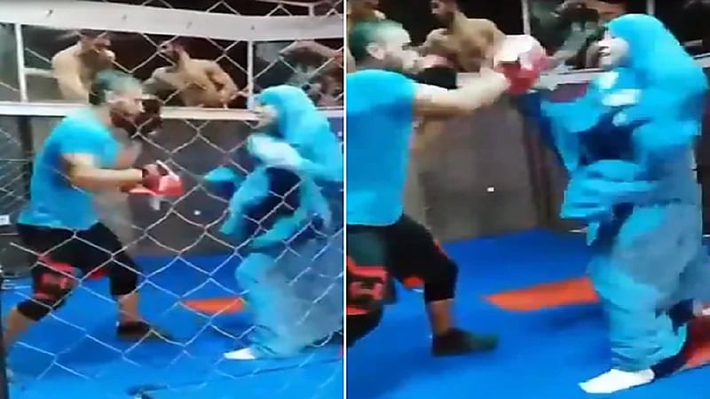 شاهد.. فتاة "محجبة" تؤدي  تمرين الملاكمة أمام مدربها بمهارة عالية