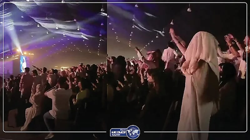 فتاة كهربائية تدخل في حالة رقص هستيري في المدرجات