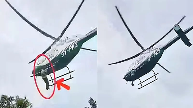 شاب يتمسك بطائرة هليكوبتر لحظة إقلاعها في حفل زفاف.. فيديو